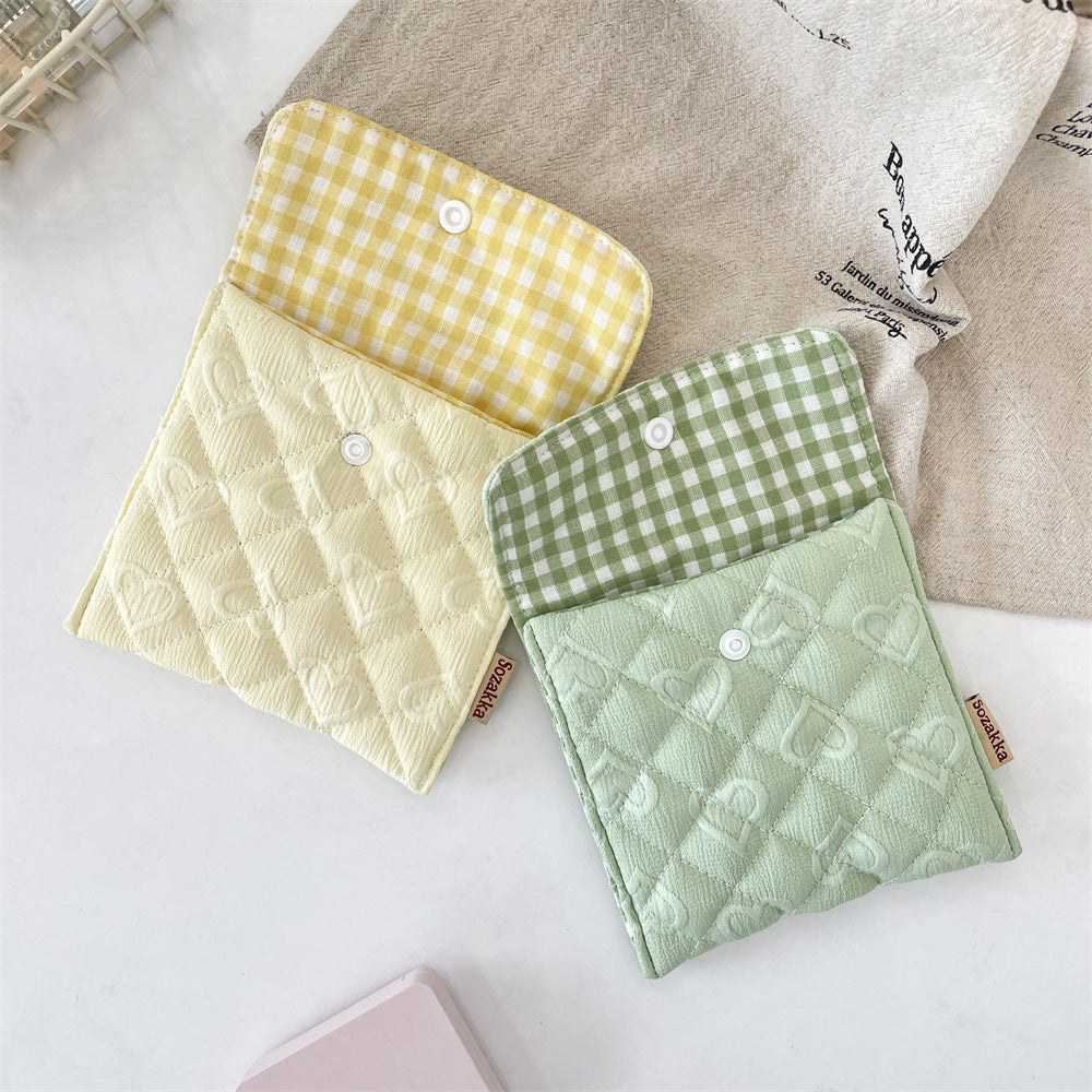 ハートキルティングのミニサニタリーポーチクラッチ